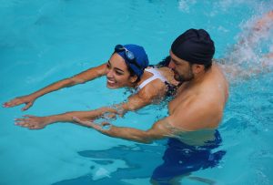Woman taking swim lessons